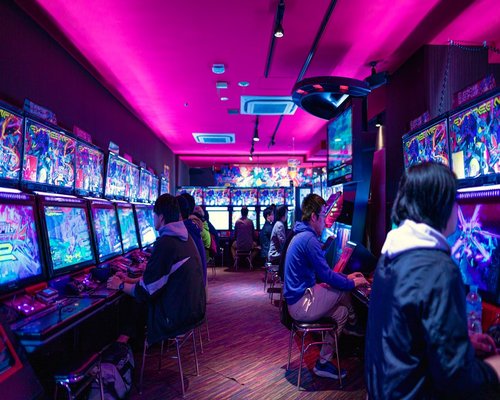 Modern neon casino slot machines vibrant entertainment gaming atmosphere